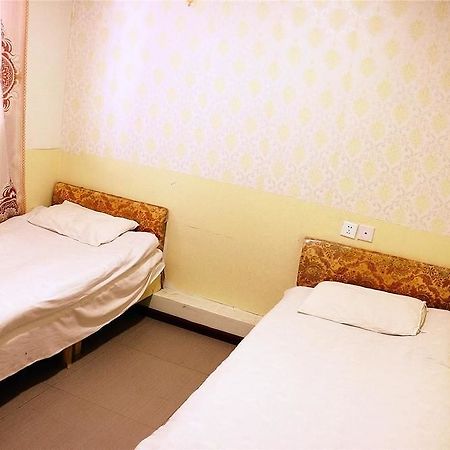 Qingdao Peninsula Four Seasons Business Hotel Екстериор снимка