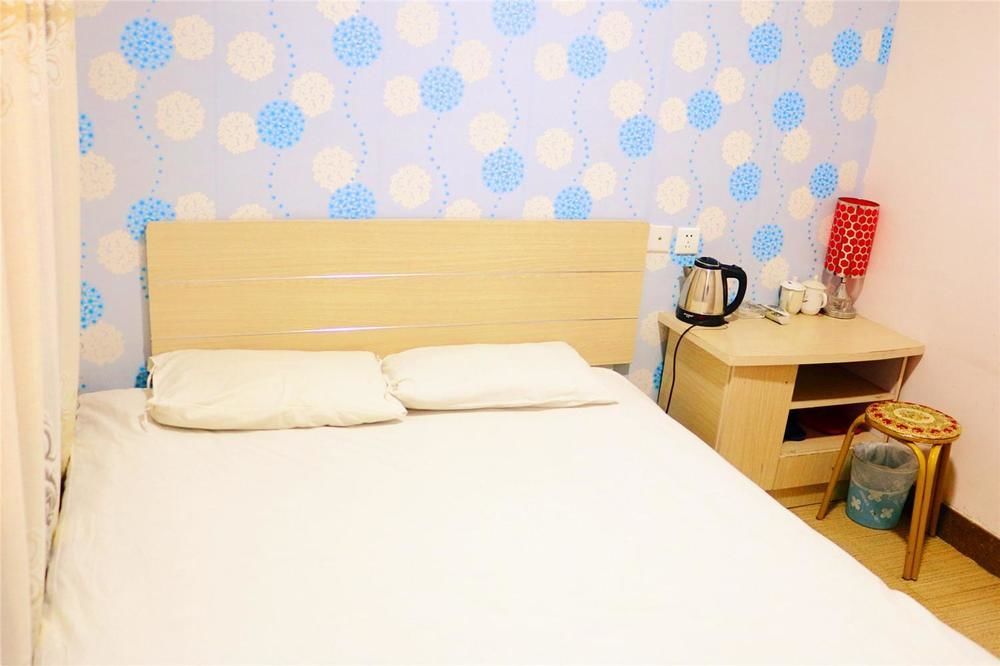 Qingdao Peninsula Four Seasons Business Hotel Екстериор снимка