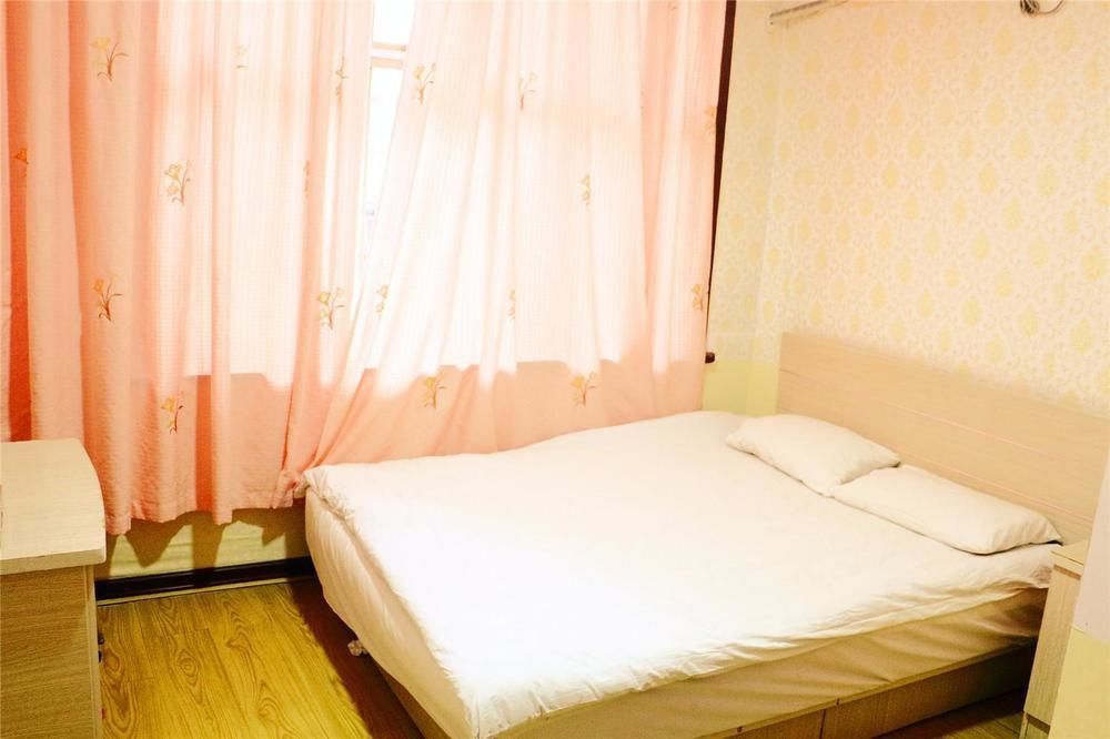 Qingdao Peninsula Four Seasons Business Hotel Екстериор снимка