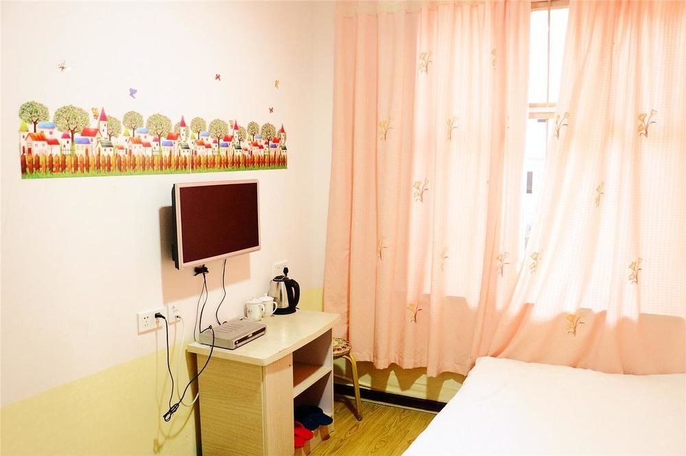 Qingdao Peninsula Four Seasons Business Hotel Екстериор снимка