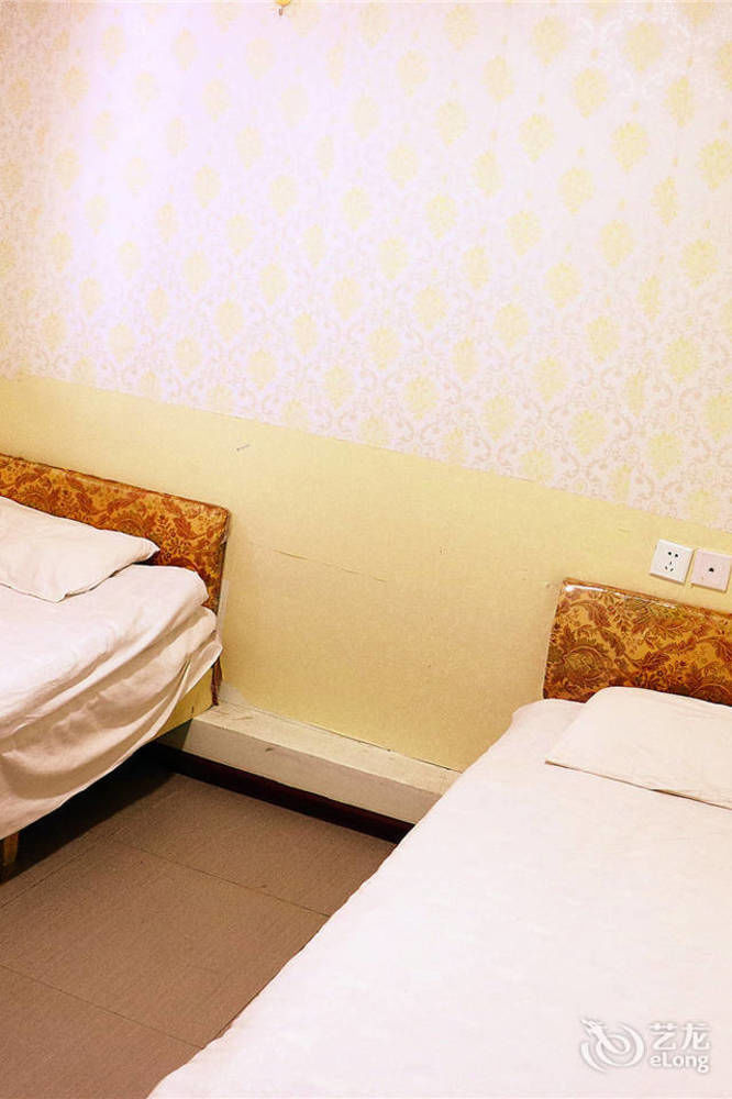 Qingdao Peninsula Four Seasons Business Hotel Екстериор снимка