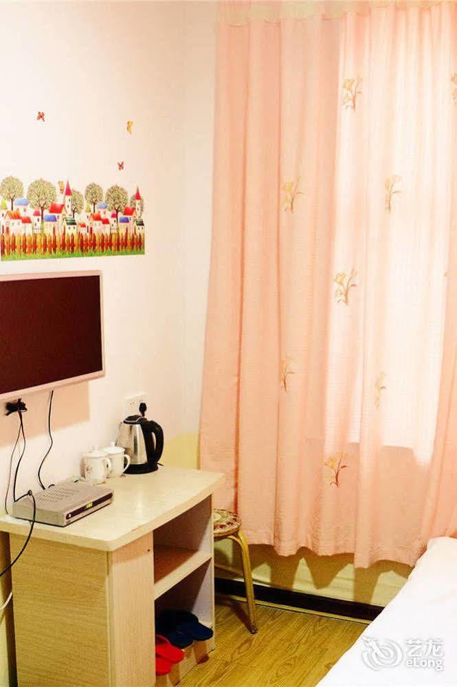 Qingdao Peninsula Four Seasons Business Hotel Екстериор снимка