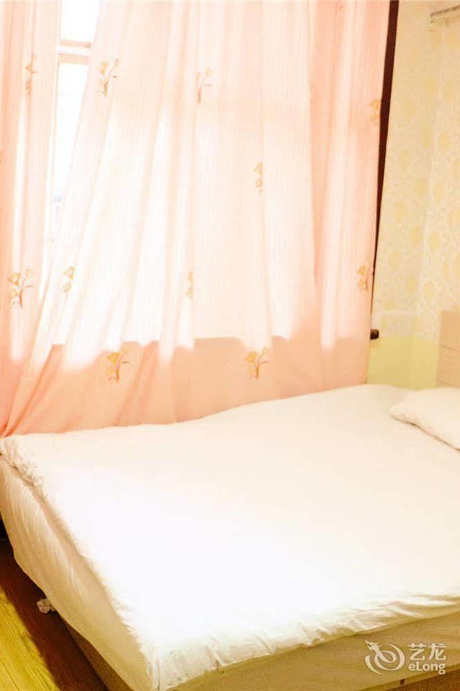 Qingdao Peninsula Four Seasons Business Hotel Екстериор снимка